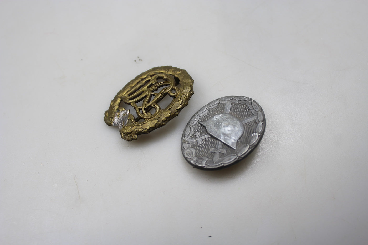 Distintivi DRL "Bronzo" e Ferita "silver" denazificati