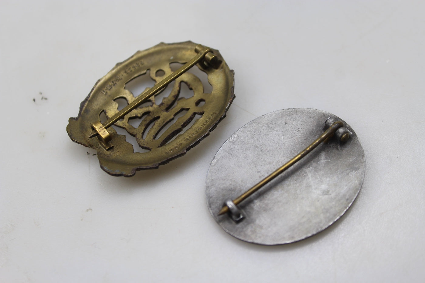 Distintivi DRL "Bronzo" e Ferita "silver" denazificati