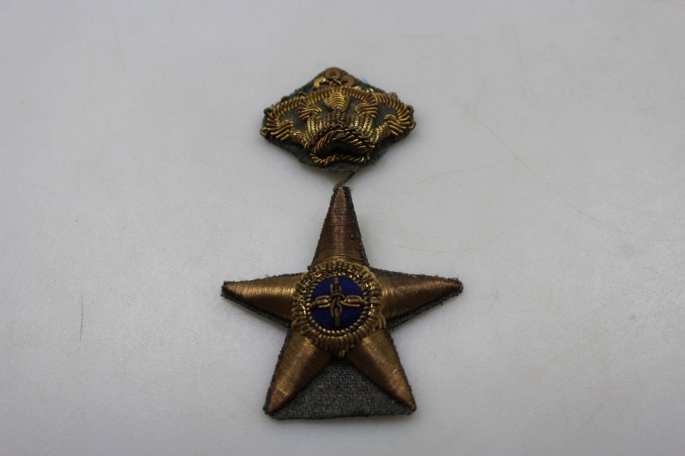 Fregio berretto M.34 Ufficiale REI