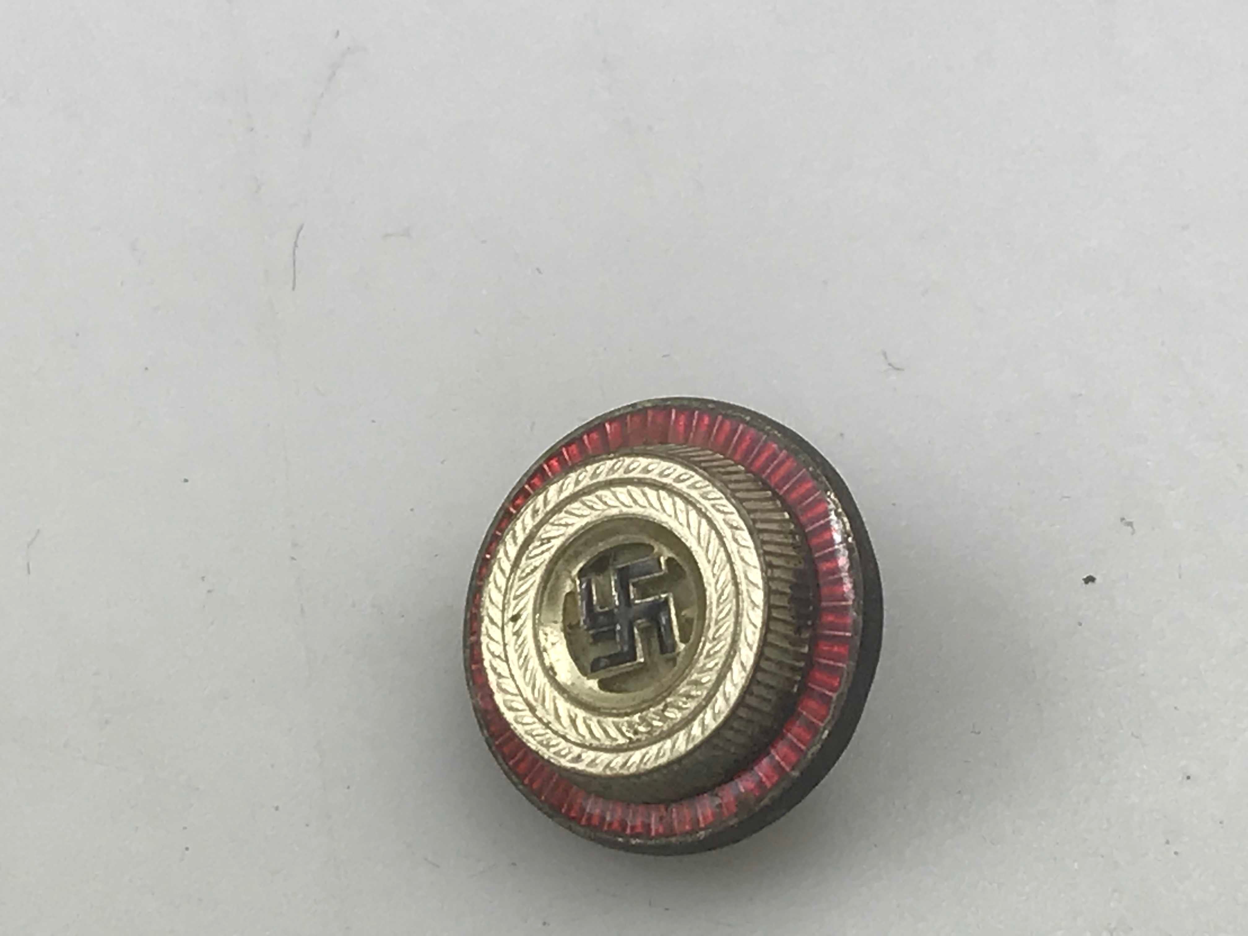 Coccarda smaltata Schirmmutze NSDAP,