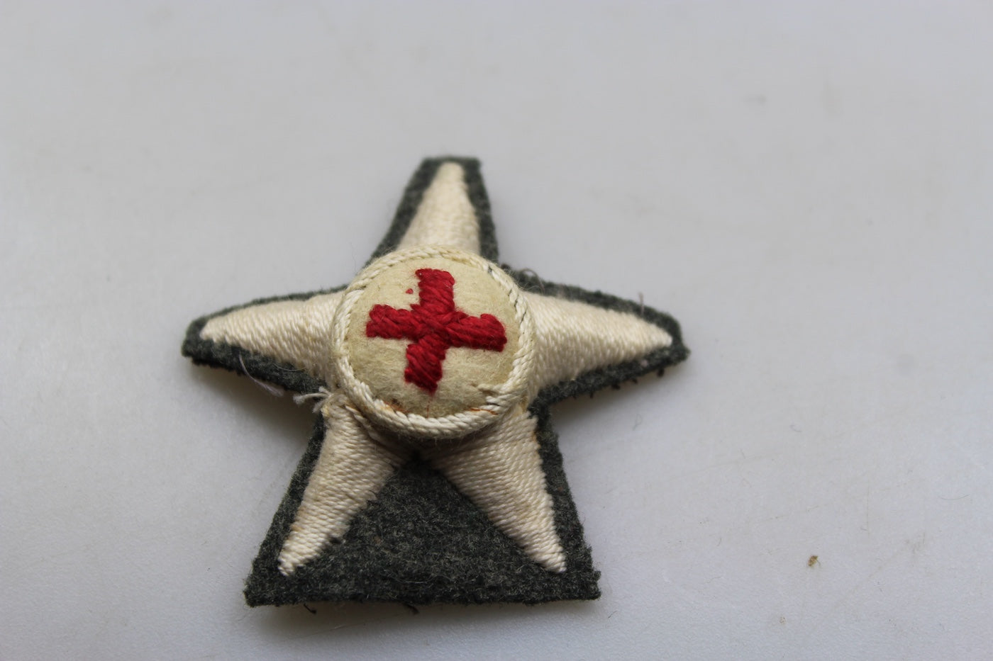 Fregio per copricapo CRI WW2